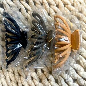 3 brand new hair claws